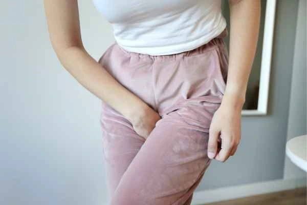 woman struggling with urine incontinence Woking